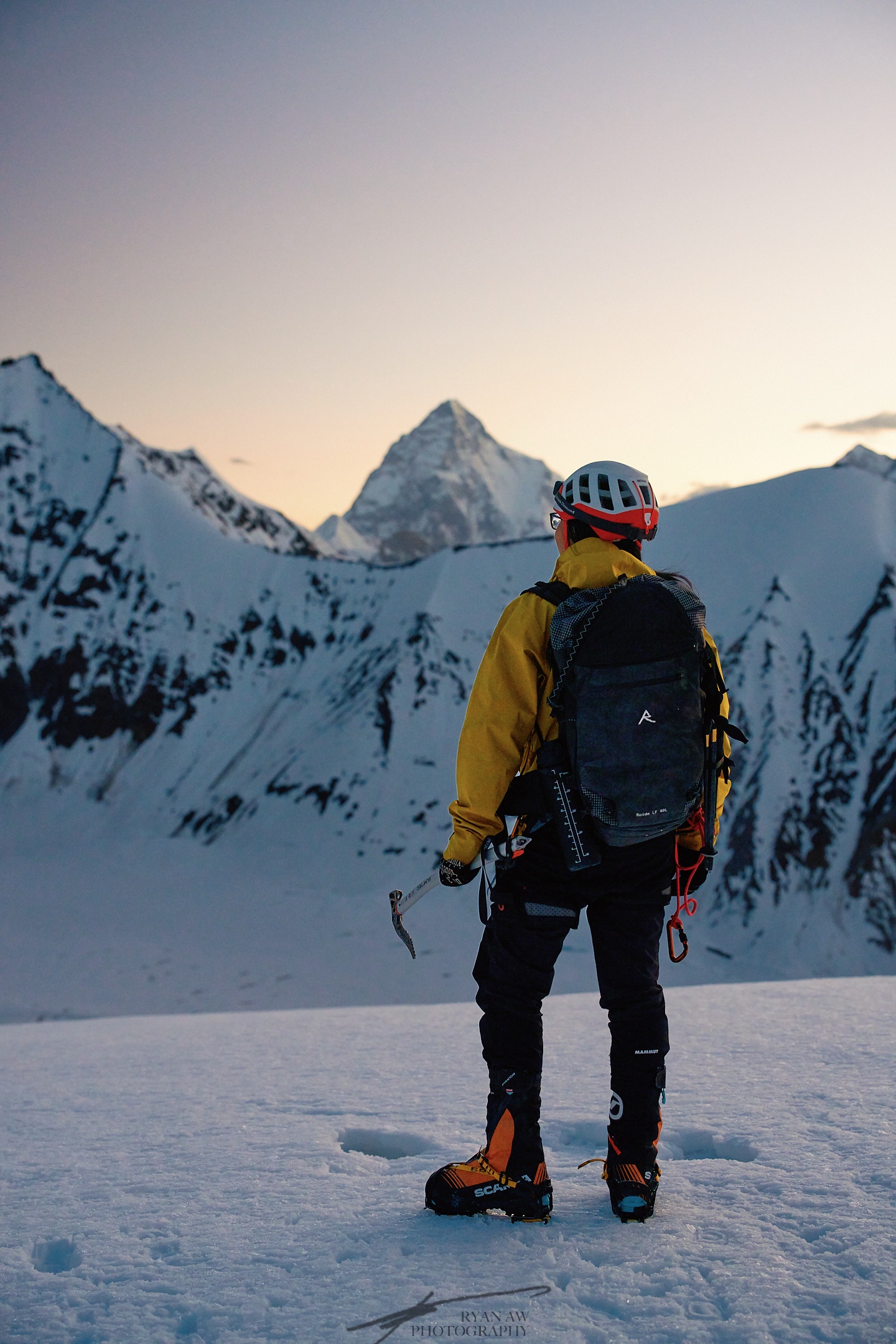 A photo of me standing atop the Gondogoro La pass at about 5600m / 18,300ft. Directly in front is K2, or Chogori, 2nd tallest mountain in the world and notoriously the most difficult to climb. To the right of the image is Broad Peak, another 8000m tall mountain. This image was captured about 10 days before the recent avalanche that killed 10 climbers including Nims, a well known mountaineer